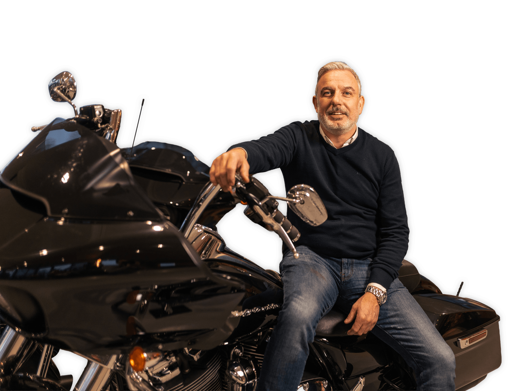 Wim van der Wekken, eigenaar van MotoXpert, op een Harley-Davidson